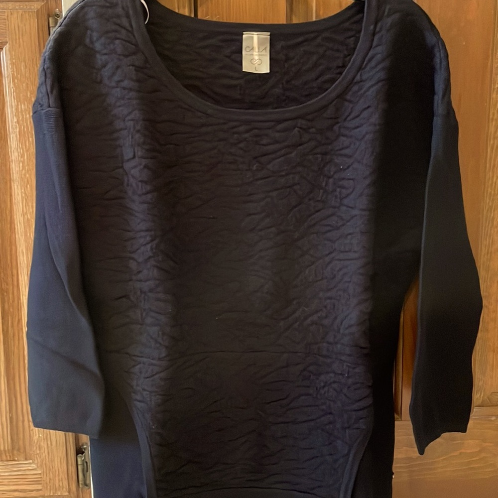 CALIA black sweater.